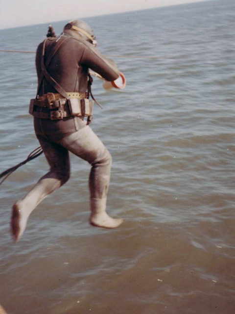 Diver entering water, North Sea, 1967.