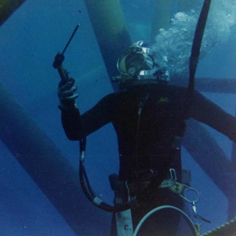 Diver with a burning rod.  Drew Michel photo. History of the Offshore Oil and Gas Industry in Southern Louisiana Volume VI: A Collection of Photographs